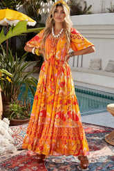 Robe longue bohème à volants et taille nouée